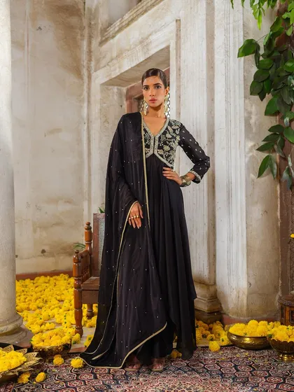 A classic black anarkali with silver embroidery from the Jashn-de-Fleurs collection, a timeless choice for an evening event.