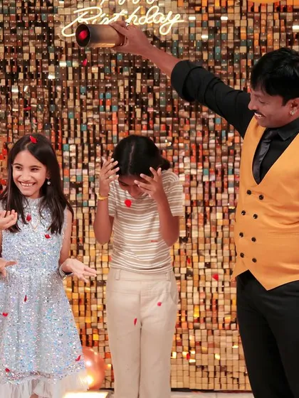 The pure delight on children's faces during a magic show. We focus on capturing the guests' reactions and the fun of the party entertainment.