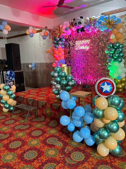 This shot shows the full party setup on a stage, with a mix of themes to create a fun and unique celebration.