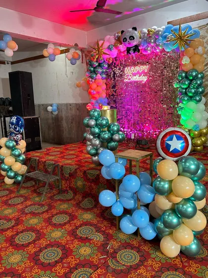 This shot shows the full party setup on a stage, with a mix of themes to create a fun and unique celebration.