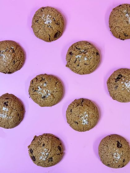 Our clean cookie is made with almonds, tahini, chocolate, a flax egg, jaggery powder, and sea salt. I dare you to try it and not like it.