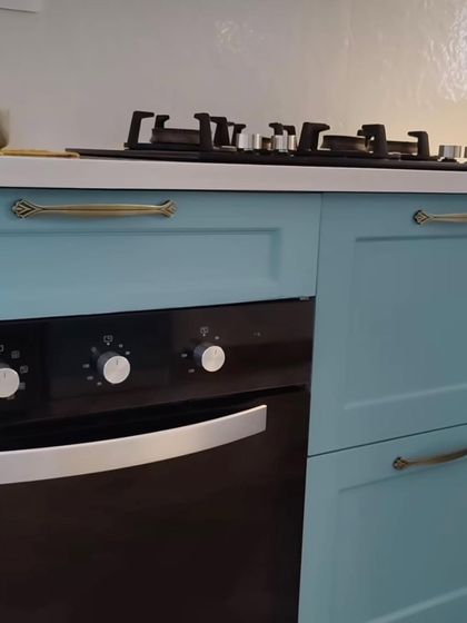 Different shots from our Lotus Boulevard project, where we opened up the kitchen to the dining area. The French-style blue kitchen, dining nook, and colorful decor create a vibrant and interactive living space.