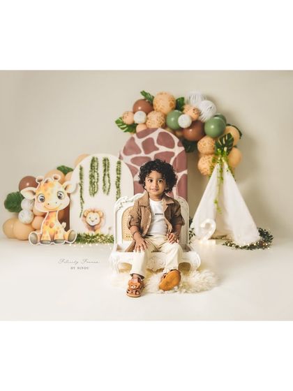 A wide shot of the safari-themed second birthday setup. I work with you to create customized themes that your child will love.