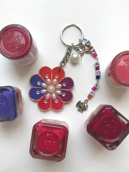 This is where the magic happens. I designed this personalised floral keychain with bright acrylic paints, pearls, and fun charms, showing how a simple MDF cutout can become a unique, handcrafted gift.