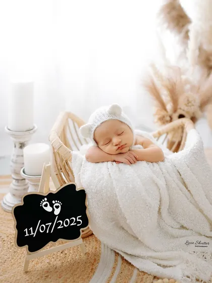 We can add a personalized touch like this chalkboard with your baby's birthdate to make the photos even more special.