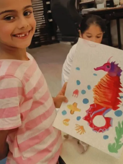Another proud artist with her completed seahorse. It's so rewarding to see them master a new technique and create something they love.