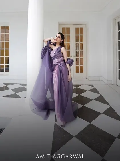 An architectural masterpiece by Amit Aggarwal. The structured silhouette and metallic fabric of this gown create a modern, powerful statement. I kept the styling minimal to let the dress be the hero.