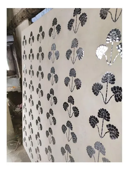 The nearly completed Thikri panel, showcasing the meticulous craftsmanship and shimmering quality of the 400-year-old art form.