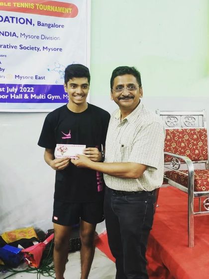 Samyak Kashyap receiving his prize for securing a bronze medal in the U19 boys category at the Mysore tournament.
