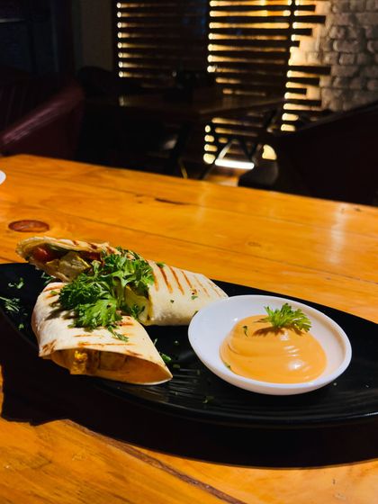 Our grilled wraps are a perfect quick and healthy meal, stuffed with fresh fillings and served with a side of dip.