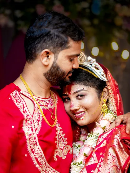 The quiet moments are just as important as the loud celebrations. Here, we captured a tender moment during a traditional Bengali wedding, highlighting the rich colors and deep emotions of the ceremony.