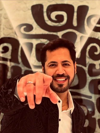 Pointing at you! A direct and engaging shot that makes you feel like you're part of the conversation.