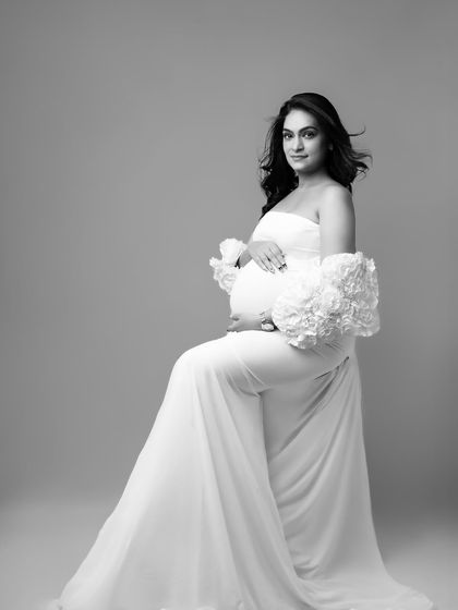 This elegant seated portrait becomes even more classic and sophisticated in monochrome.