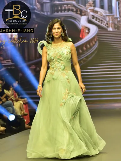 The full look of the light green sculpted gown from the "Jashn-e-Ishq" collection. It's a sophisticated and modern choice for any wedding event.