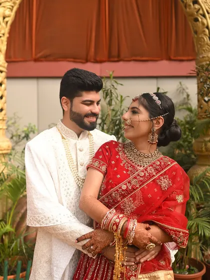 A beautiful moment between the couple. Her soft, subtle makeup ensures she looks like the best version of herself, radiant and in love.