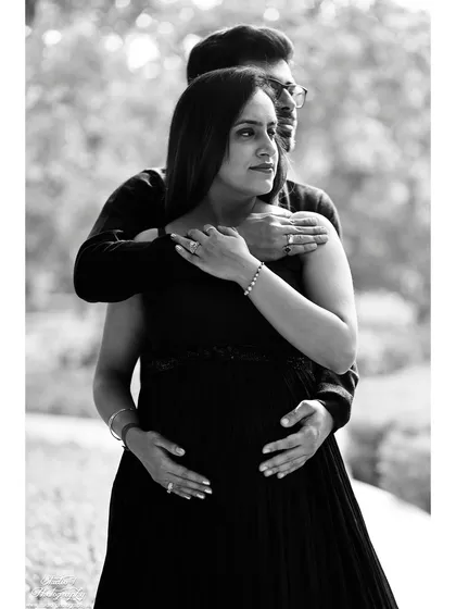 Sometimes, a moment is so timeless it needs no color. This black and white portrait focuses on the intimate embrace and emotion between a couple, creating a classic and powerful photograph.