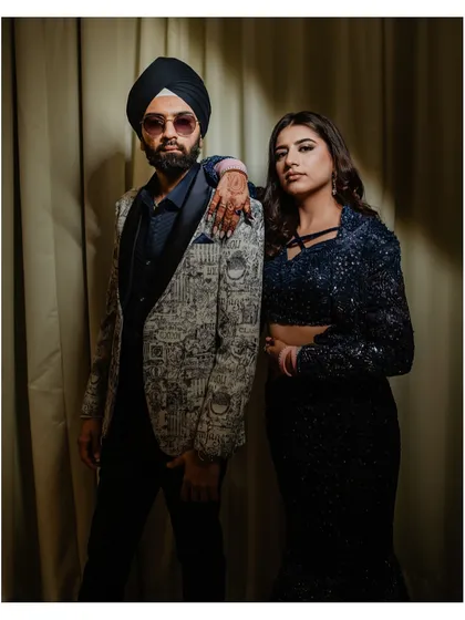 Another chic portrait of the couple, showcasing their undeniable chemistry and style at their cocktail event.