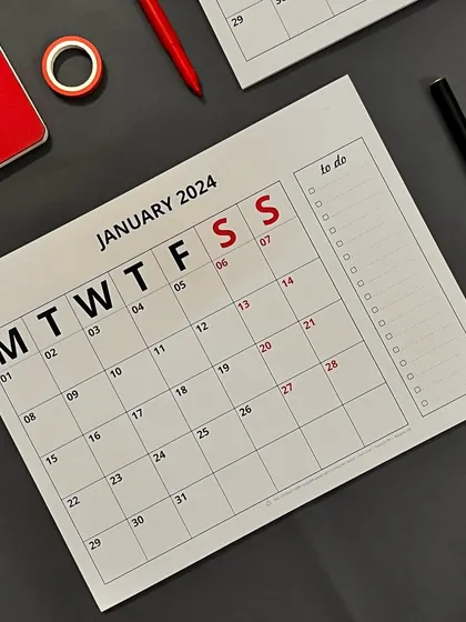 A top-down view of our BOLD 2024 monthly planner. The simple layout gives you plenty of space to write, and the to-do list on the side helps you stay on track.