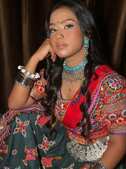 A portrait of our Navratri model. The makeup is festive and bright, designed to stand out during dandiya nights and celebrations.