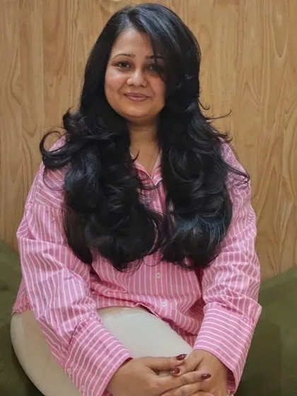 A full view of the beautiful layers and styling. This haircut is perfect for adding body to long hair while maintaining its length, creating a glamorous and healthy look.