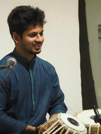 A smile shared with the audience during a lighter moment in my solo. Music is not just serious, it is also about sharing joy.
