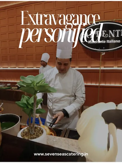 Extravagance personified. A chef at our 'Al Dente' Italian station, focused on creating the perfect dish. The branding and setup reflect a commitment to high-end, specialized concepts.