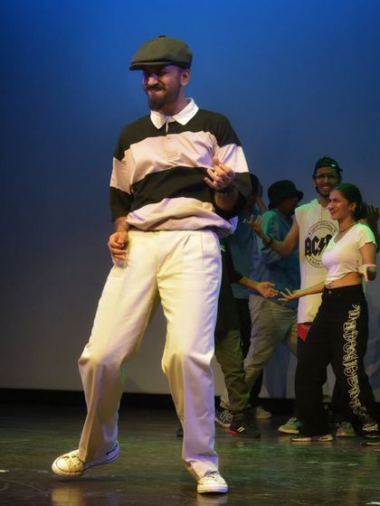 The feeling of being on stage, in the groove. This photo captures the joy and focus during a live locking performance with my crew.