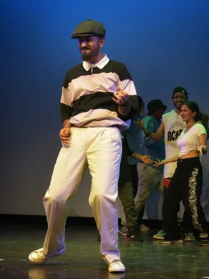 The feeling of being on stage, in the groove. This photo captures the joy and focus during a live locking performance with my crew.