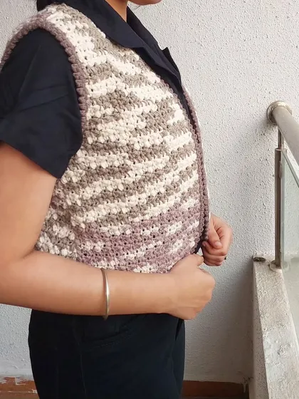 A side view of the Lisa Vest, showing its comfortable, straight fit.