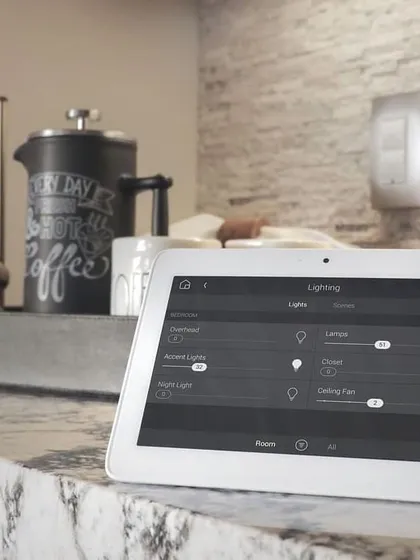 A dedicated touch panel provides a central hub for managing your home's lighting. From this interface, you can adjust brightness levels, control individual lights, and activate different lighting scenes with ease.