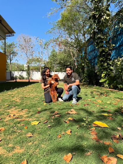 A happy moment with Pablo the poodle in our spacious, leafy yard.
