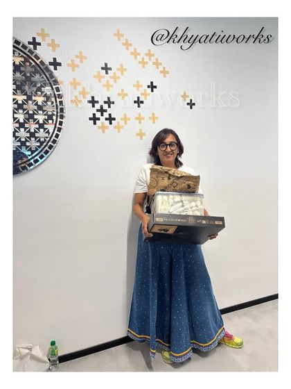 A successful installation day at another office project. This mural features geometric patterns and mirrored elements to create a modern and sophisticated look.