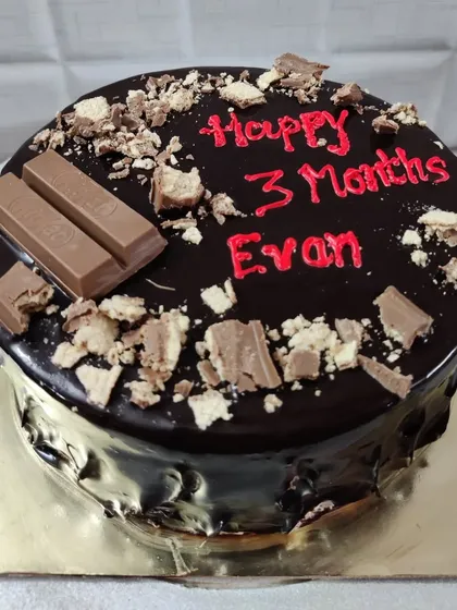 A KitKat chocolate cake to celebrate Evan's 3-month milestone. A sweet treat for a sweet occasion.