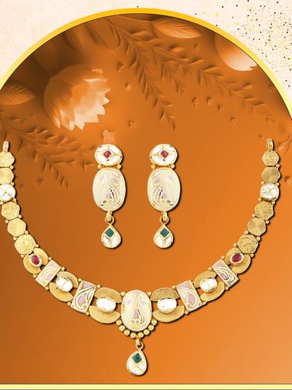 A beautiful necklace and earring set with oval-shaped motifs, enamel work, and coloured stones. This is a perfect example of our meaningful, contemporary jewellery collections.