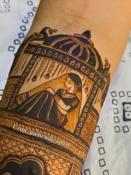 The same 'doli' design with a darker, more developed henna stain, showcasing the beautiful contrast and detail that emerges.