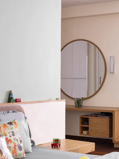 This view shows the custom curved dresser and mirror in the 'A Walk in the Clouds' kid's bedroom, which complements the playing deck.