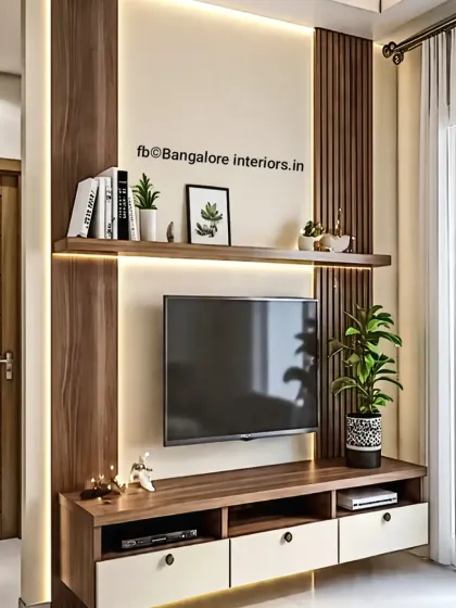 A functional and stylish TV cabinet featuring a mix of closed drawers and open compartments for media devices. We used wood tones and soft backlighting to create a warm and inviting atmosphere in this living space.