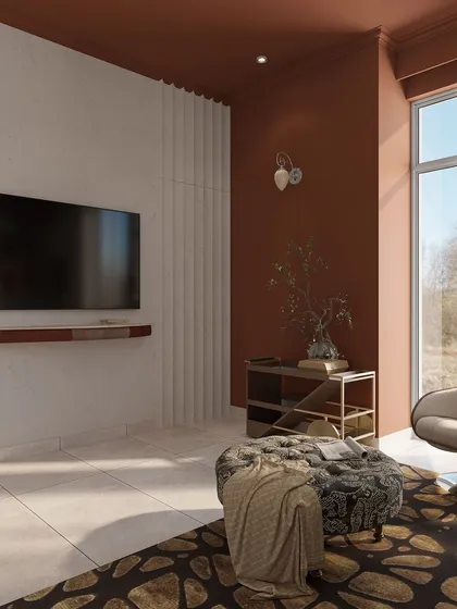 The TV wall in the entertainment room contrasts a textured white panel with the rich rust-colored walls, creating a modern and dynamic focal point.