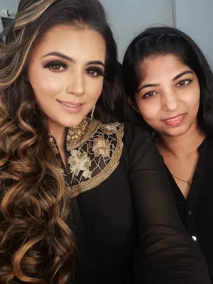 A happy client ready for her event. The black smokey eyes and nude lips are a classic combination that never goes out of style.