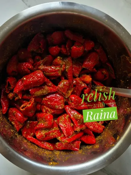 This is my Stuffed Red Chilli Pickle, a much-awaited winter special. I use thick, good-quality red chillies that are available from January onwards. The chillies are stuffed with a spicy masala and turn soft and bright red as the pickle matures.