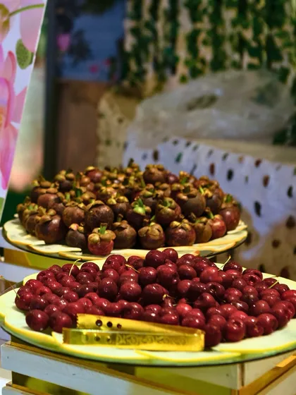 Platters of fresh, seasonal fruits like cherries and mangosteens. We source the best quality produce to offer a refreshing and healthy option for your guests.