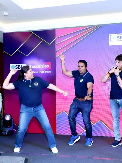 A fun dance segment on stage with the employees of SBICAP Securities. I love creating unforgettable, enjoyable moments.