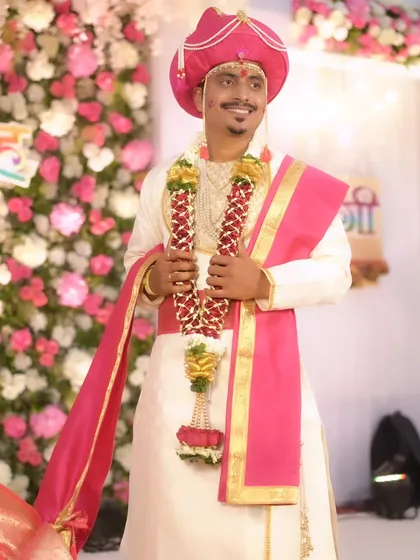 A smiling Maharashtrian groom, looking joyful and ready for his wedding ceremony.