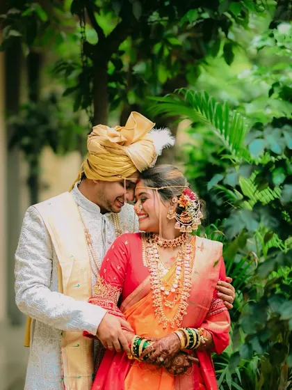 A quiet, romantic moment between the couple. These gentle, candid interactions are just as important as the main ceremonies in telling your unique love story.