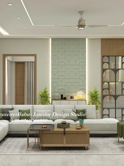 A full view of a 3BHK living room designed with soft pastels and earthy tones. The combination of a light-colored sofa, green ottomans, and wooden furniture creates a refreshing and calming atmosphere. The 3D wall panel and unique display unit add a modern, artistic touch.