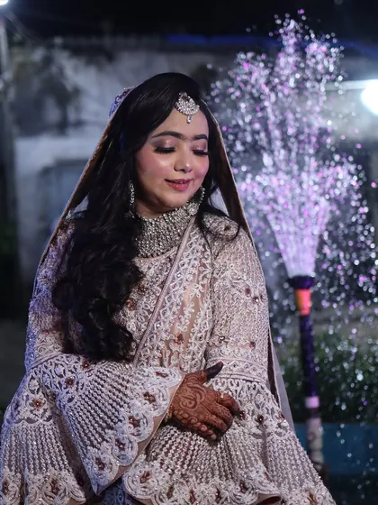 A dreamy shot of my reception bride. The soft focus and the fountain in the background add to the romantic and magical feel of the moment.