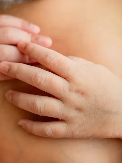 It's all about the tiny details. A close-up of your baby's hands, feet, or delicate features creates a powerful, artistic memory of how small they once were.