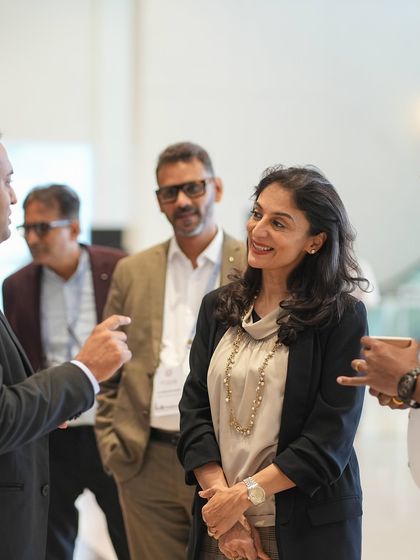 I believe in building partnerships. This image shows me listening to a group of educators at the TAISI conference, learning about their unique challenges and sharing insights on how to foster better parent-teacher communication.