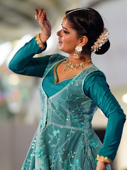 A close-up showing the expressive 'abhinaya' aspect of my performance at the CIDCO Auditorium. Connecting with the audience, especially the younger ones, through emotion and storytelling is a joyous part of my art.