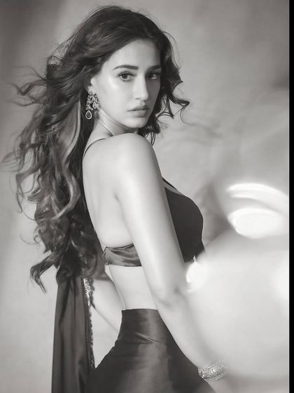 A black and white version of the Diwali look. It highlights the texture and volume of the hair, along with the beautiful contrast of the makeup.